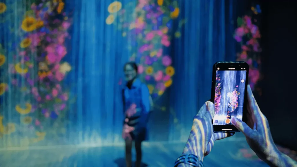 PwC Holo-Selfiee holographic experience with employees viewing personal holograms on the Holo Stage, by ViitorCloud